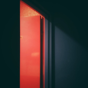 An Open Red Flush Door