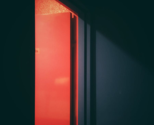 An Open Red Flush Door